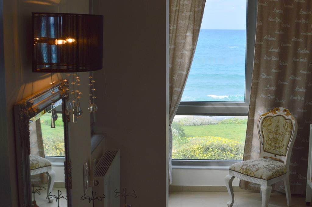 Sea View Beachfront Villa Peri Гуве Экстерьер фото
