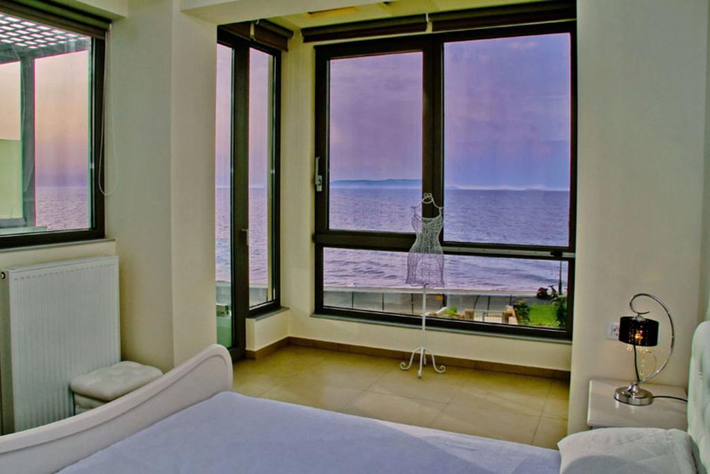 Sea View Beachfront Villa Peri Гуве Экстерьер фото